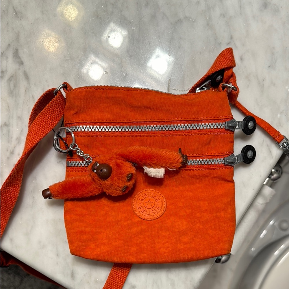 Kipling Orange Sporty Crossbody Bag with Silver Hardware
